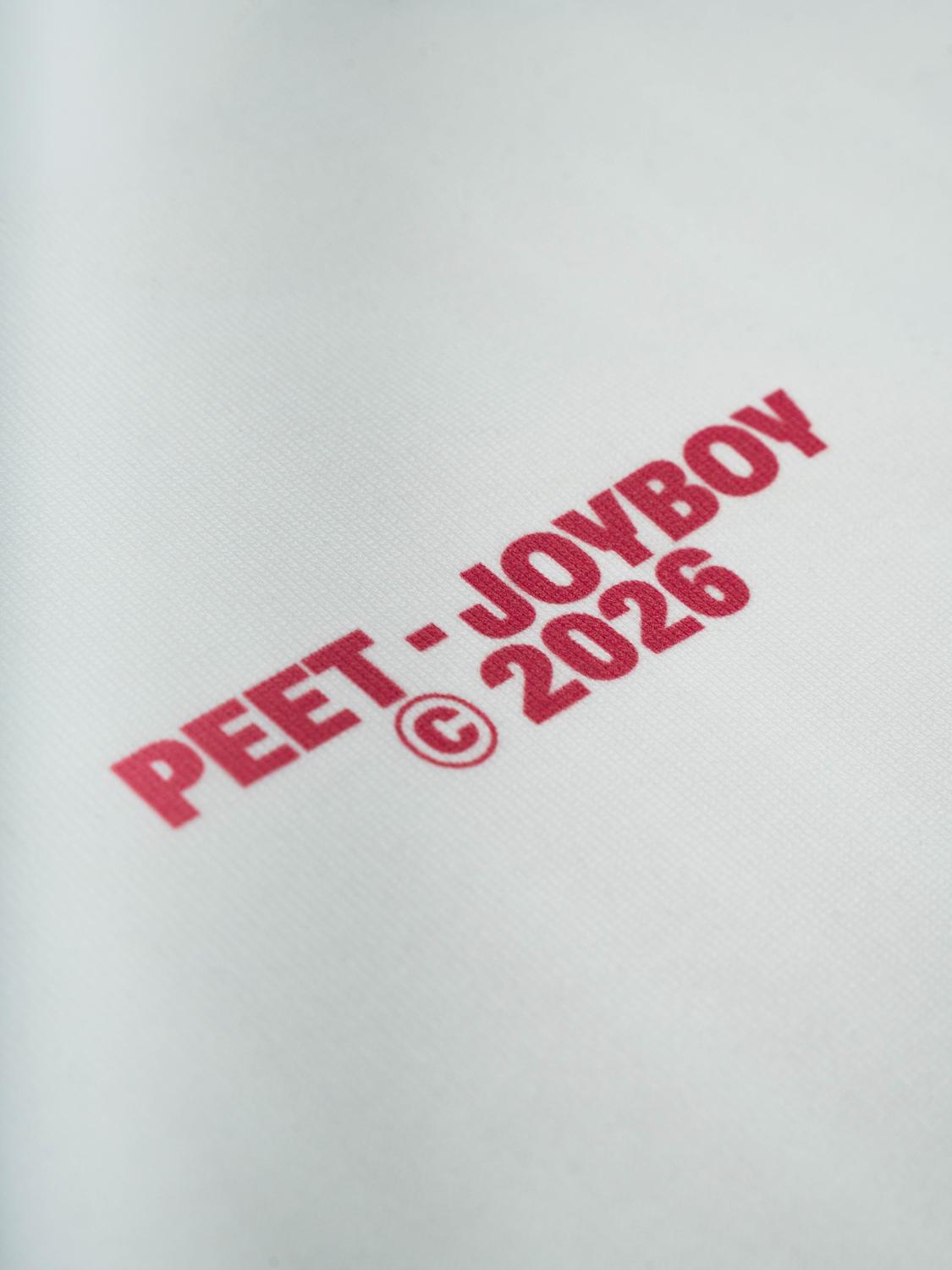 Détail de l'impression Peet - Joyboy 2026 sur tissu blanc